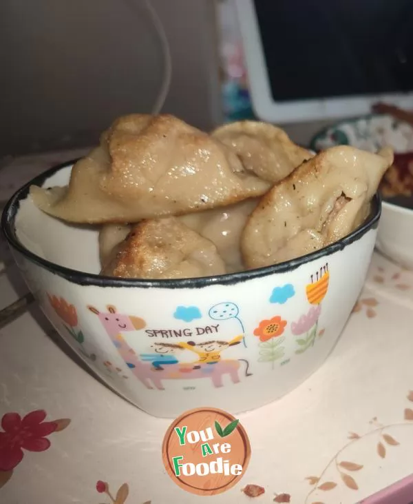 Fried dumplings with orange juice