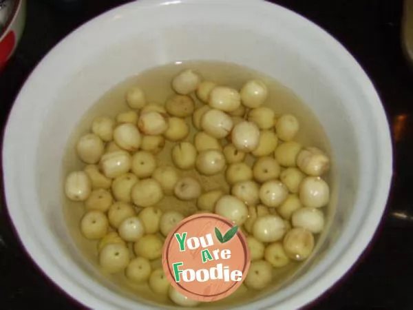 Sweet glutinous rice porridge with longan and lotus seeds