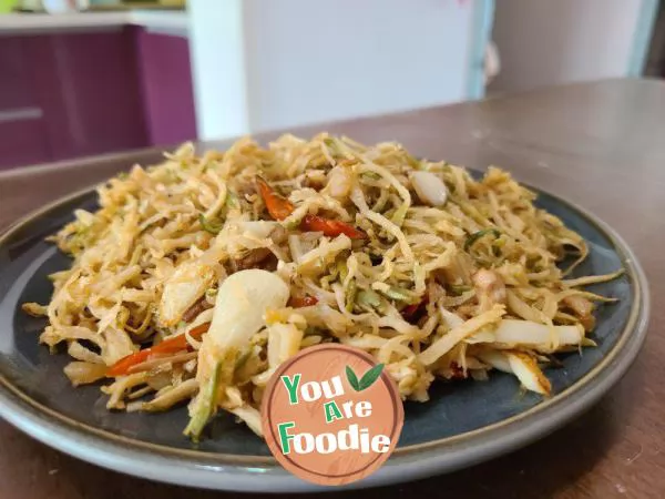 Stir fried shredded pork with dried white radish