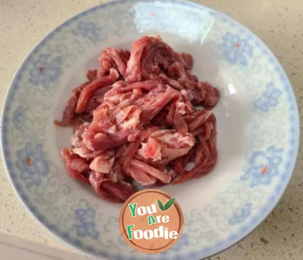 Stir fried shredded pork with dried white radish