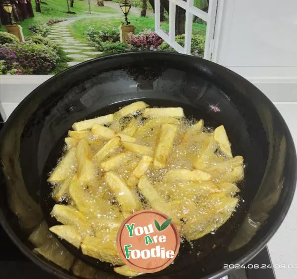 Fried potatoes and stir fried garlic sprouts