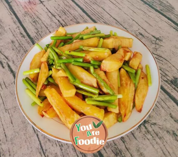 Fried potatoes and stir fried garlic sprouts