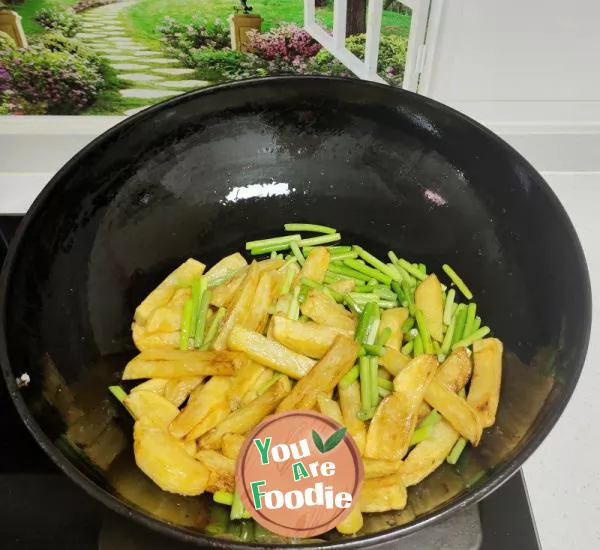 Fried potatoes and stir fried garlic sprouts