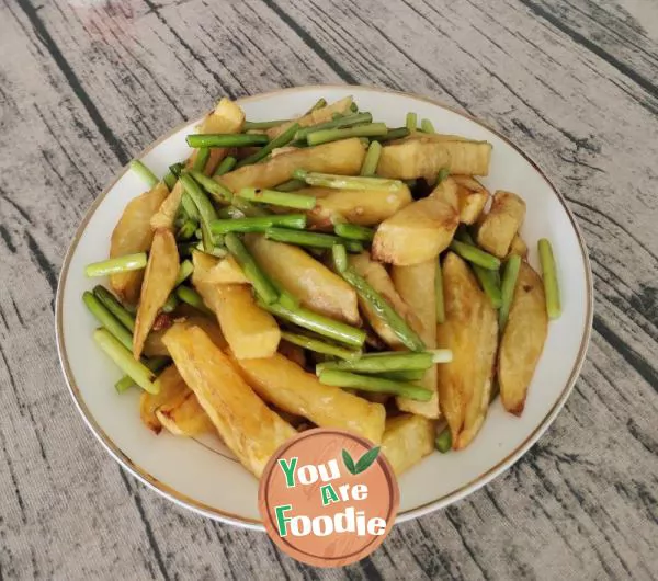 Fried potatoes and stir fried garlic sprouts