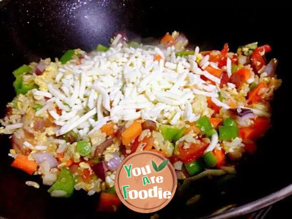 Baked rice with vegetables, cheese and eggs