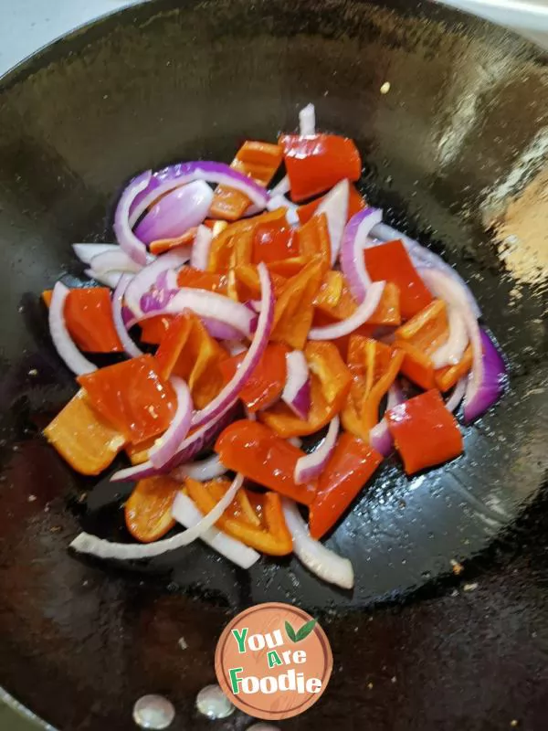 Stir fried meat with onions and chili peppers