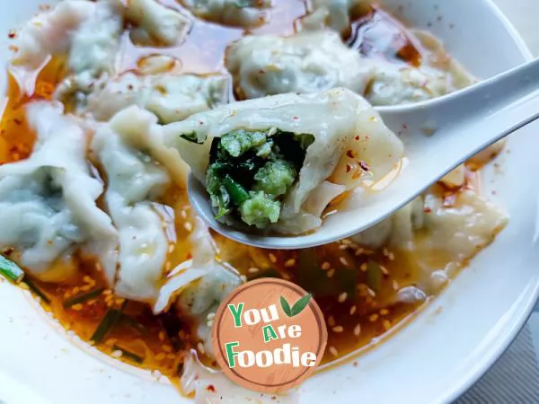 Boiled dumplings in sour soup