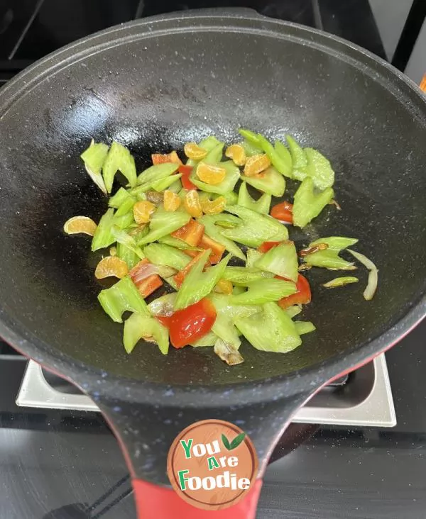 Fried celery with vegetables