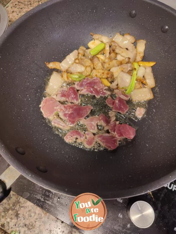 Pork belly with garlic sprouts