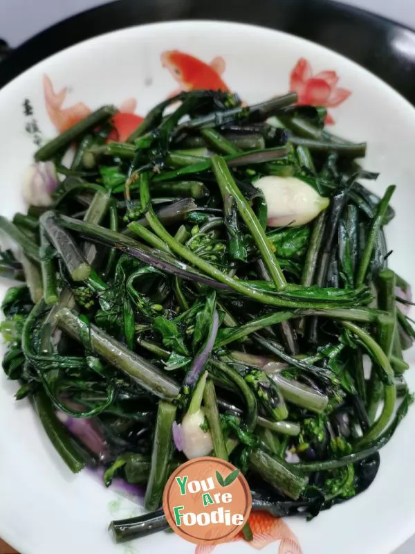 Stir fried garlic with red vegetable moss