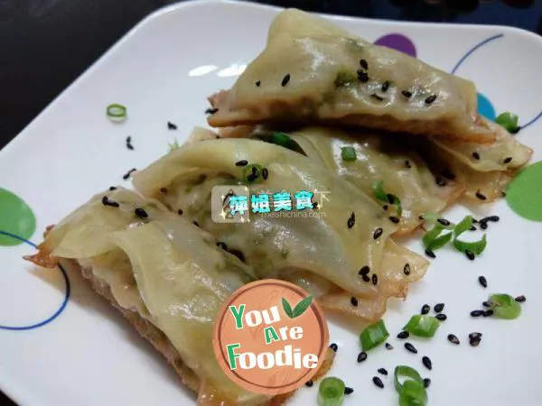 Pot stickers stuffed with Chinese toon and meat