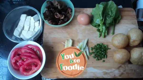 Oil gluten tomato tofu soup