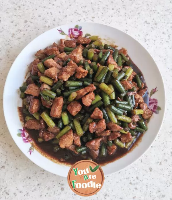 Stir fried pork with garlic sprouts