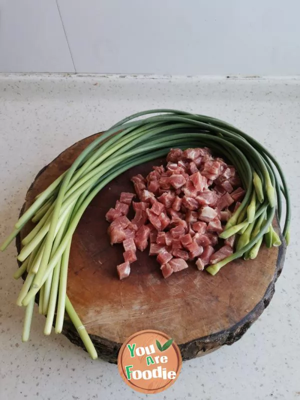 Stir fried pork with garlic sprouts