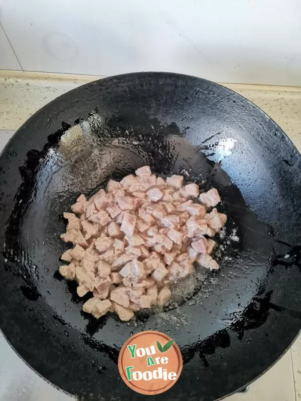 Stir fried pork with garlic sprouts