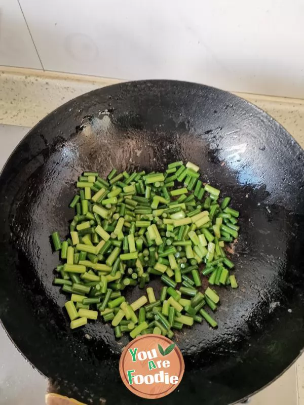 Stir fried pork with garlic sprouts