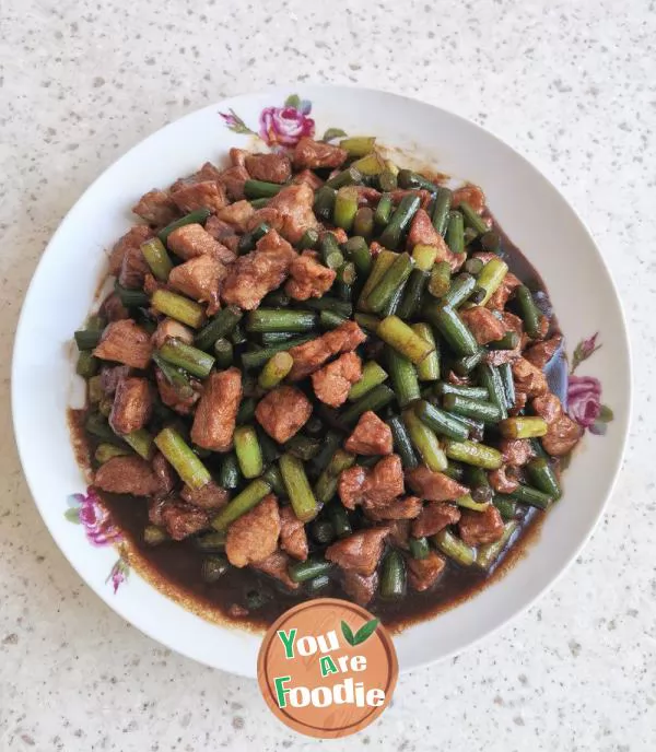 Stir fried pork with garlic sprouts