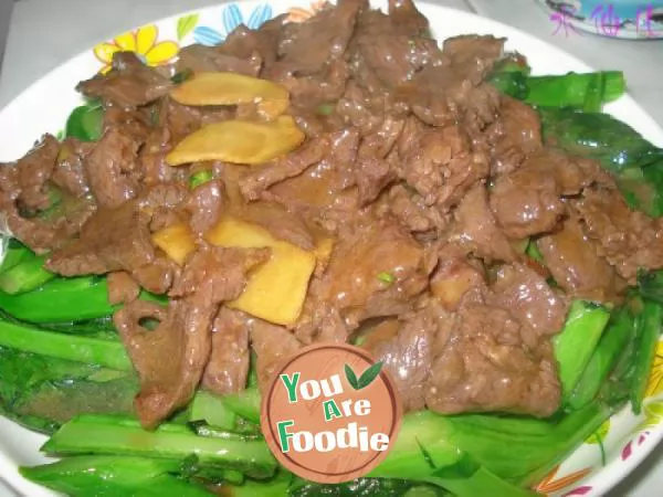 Fried beef with mustard in oyster sauce