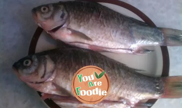 Braised crucian with bean paste