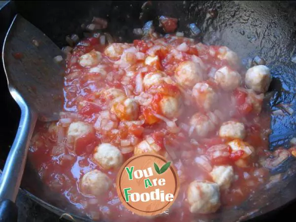 Rice with fish balls in tomato sauce