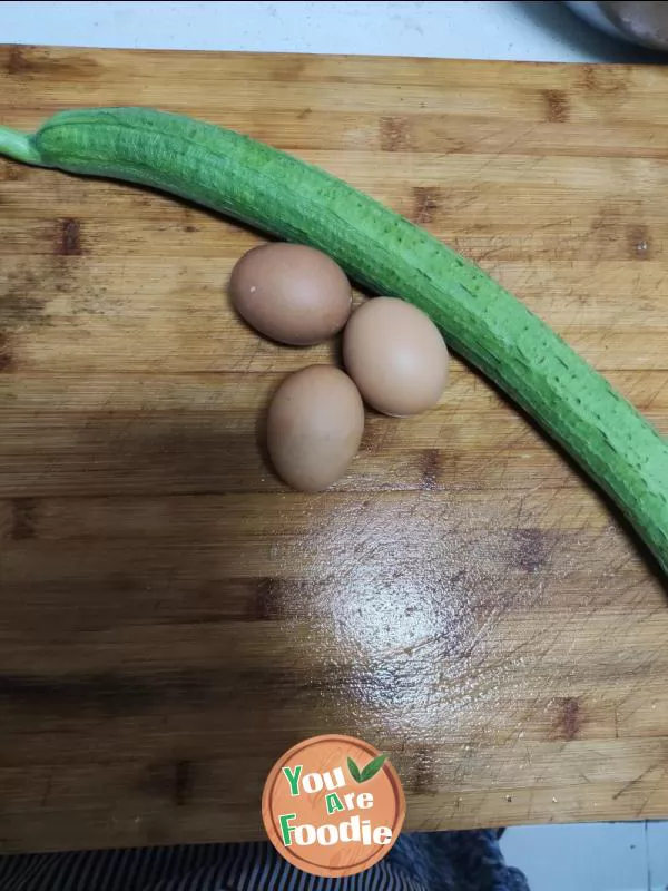 Fried egg with towel gourd