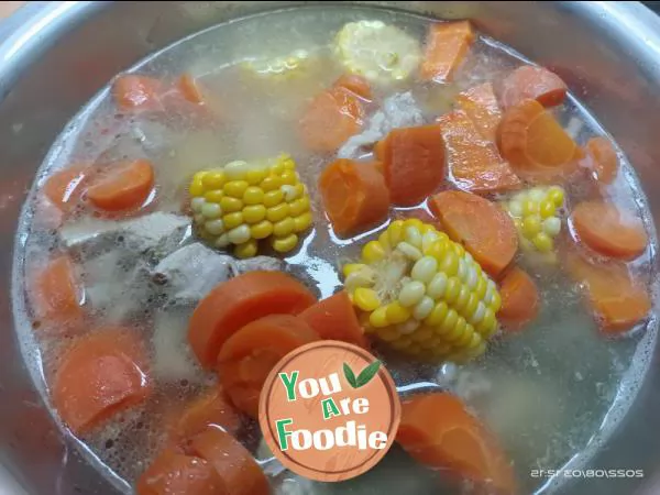 Pork ribs, carrots and corn soup