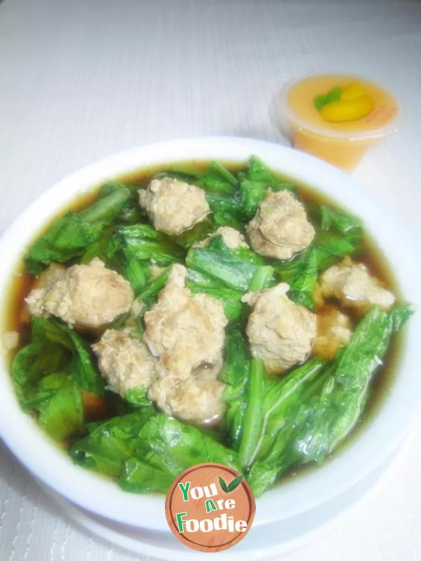 Boiled meatballs with oats and vegetables