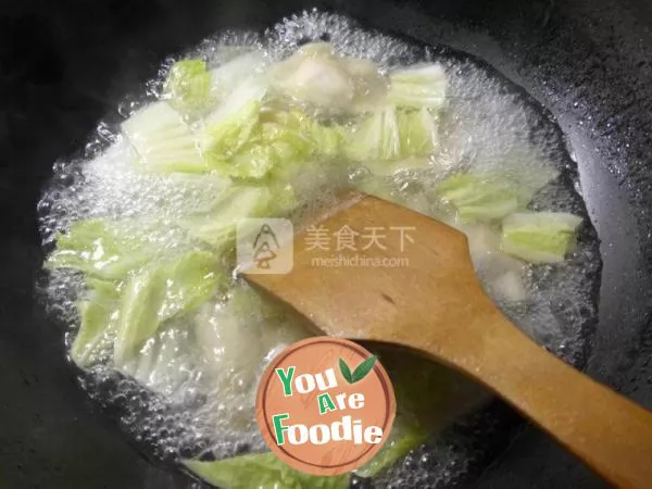 Boiled dumplings with cabbage and flour