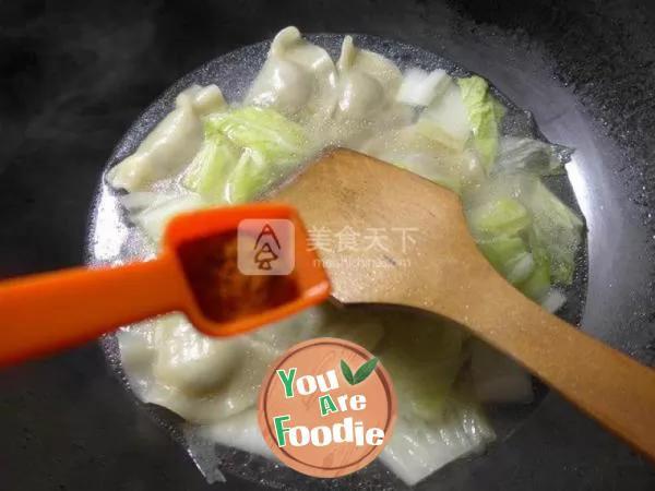 Boiled dumplings with cabbage and flour