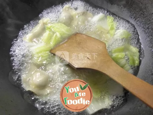 Boiled dumplings with cabbage and flour