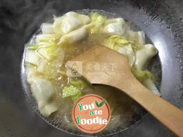 Boiled dumplings with cabbage and flour