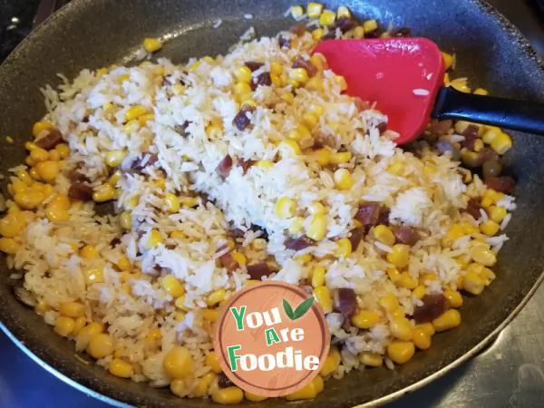 Fried rice with sausage and corn eggs