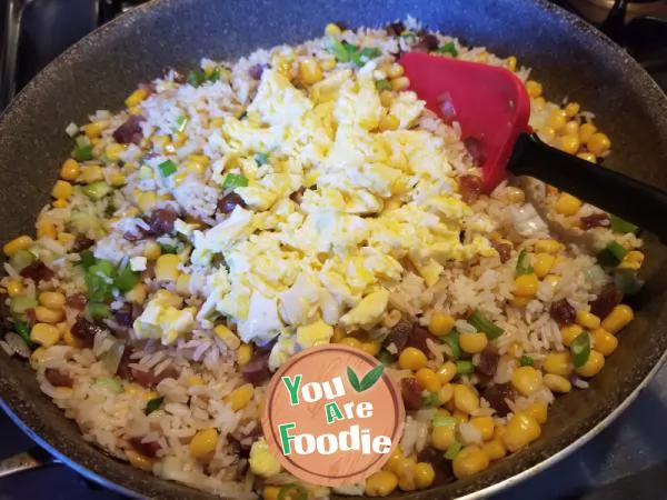 Fried rice with sausage and corn eggs