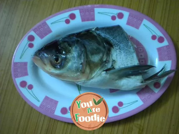 Stewed eggplant with fish head