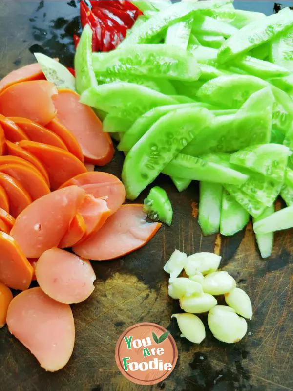 Stir fried cucumber with crab sausage