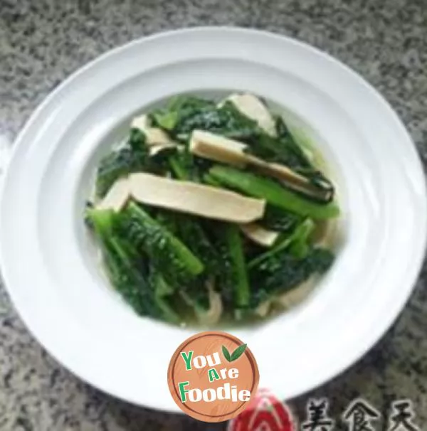 Stir fried lettuce leaves with dried tofu