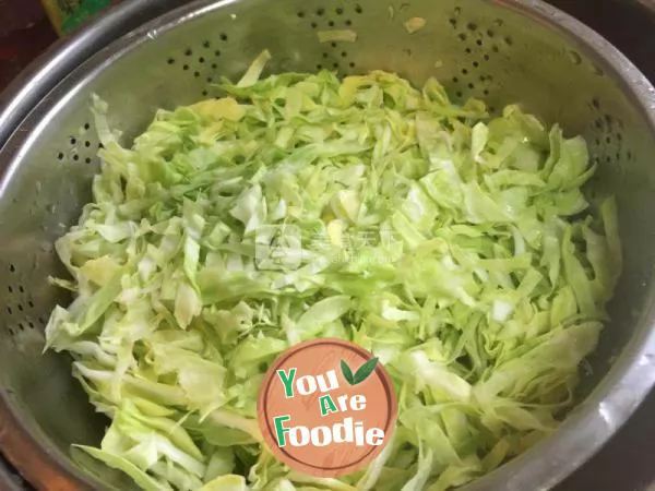 Shredded cabbage with minced garlic