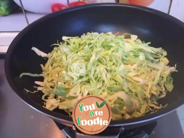 Shredded cabbage with minced garlic