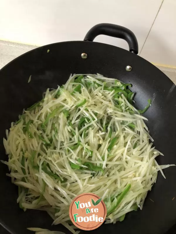 Shredded potato with green pepper