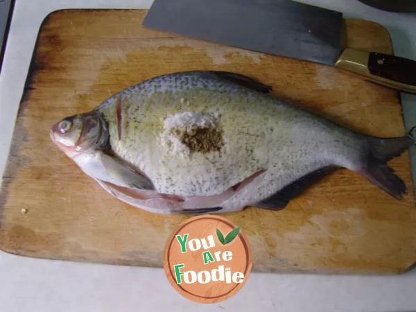 Braised fish with peacock and pepper