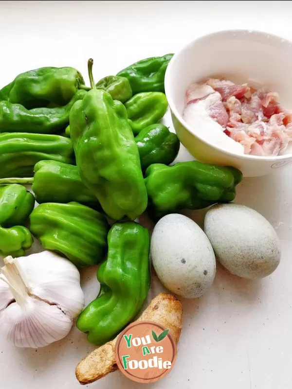 Fried preserved egg with green pepper