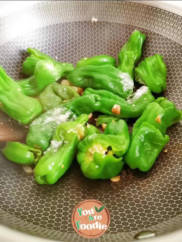 Fried preserved egg with green pepper