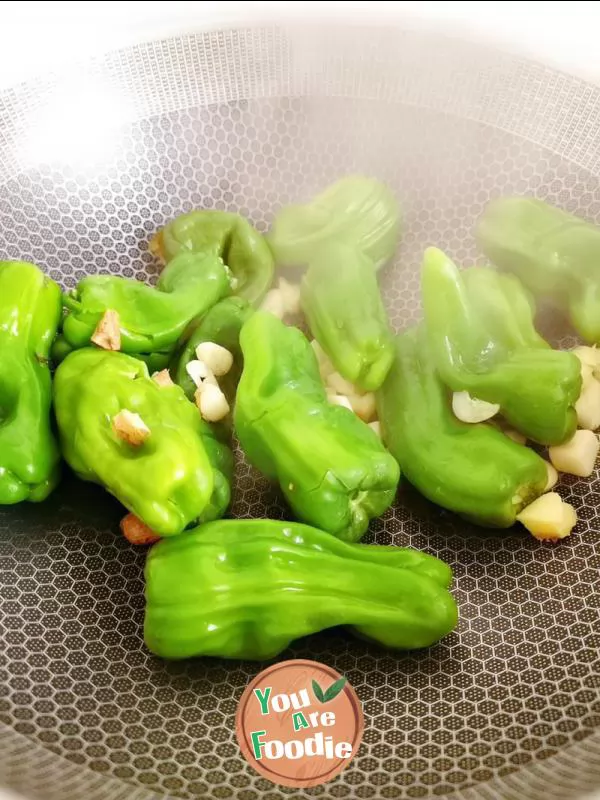 Fried preserved egg with green pepper