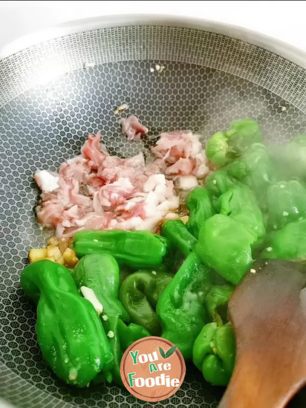 Fried preserved egg with green pepper