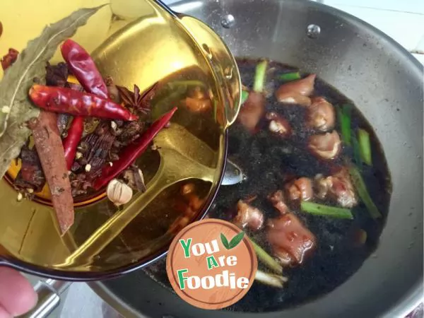 Stewed pork feet with soybean and radish