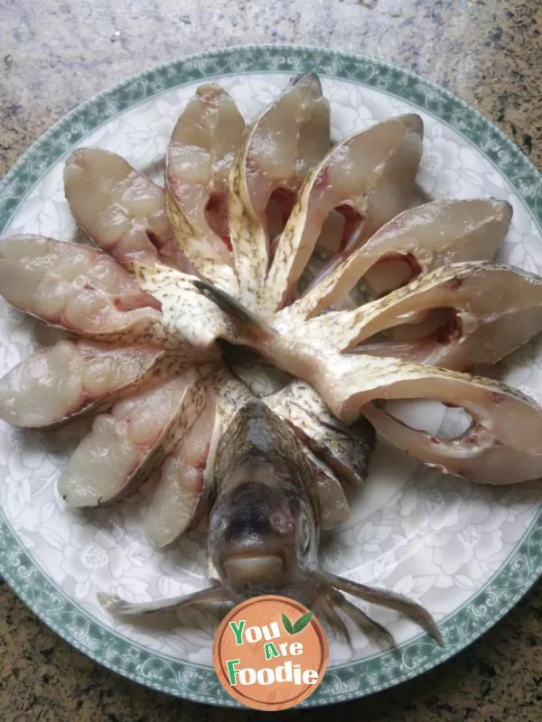 Steamed fish with peacock