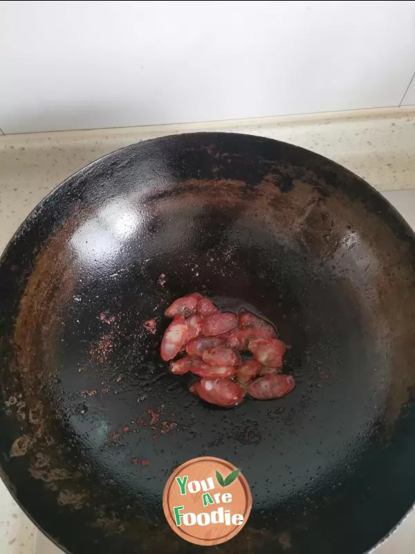 Fried sausage with pepper