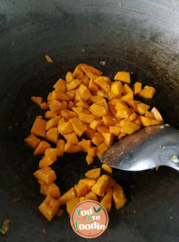 Fried rice with pumpkin and preserved meat