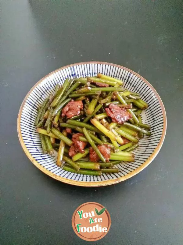 Kwai delicious food fried meat with garlic moss