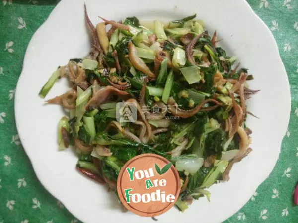 Stir fried baby squid with green vegetables